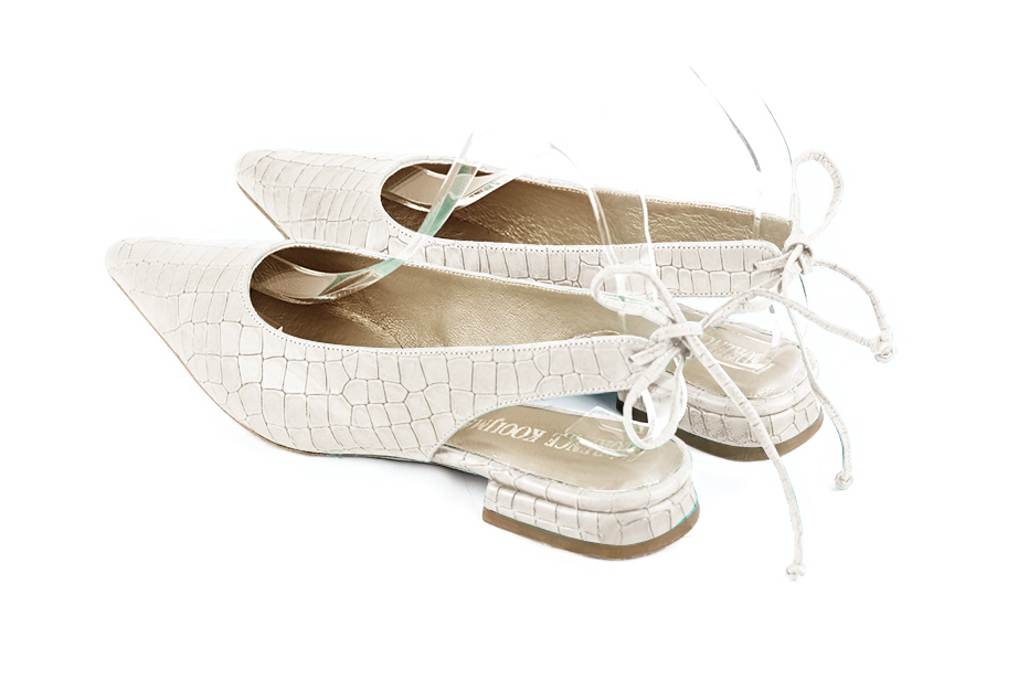 Women's off white elegant slingback heels. Pointed toe. Flat flare heels - Rear view